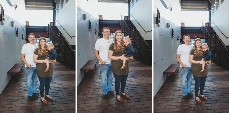 family in walkway by staircase