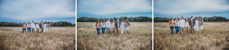 extended family walking in grassy field